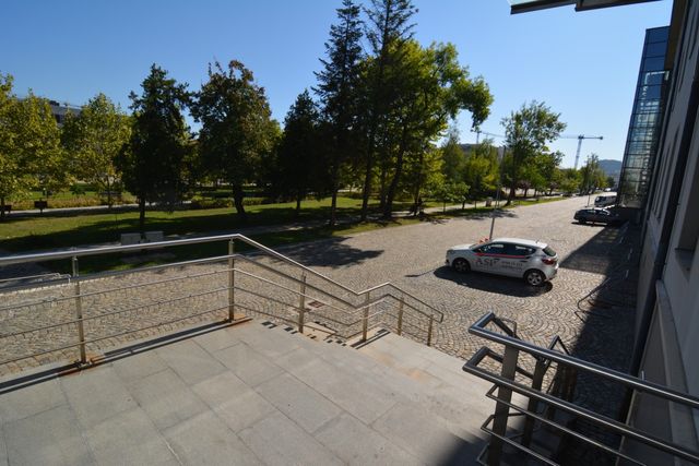 Big recognizable modern building with a bridge view of Sofia