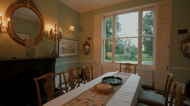 Elegant Regency estate with a private lake and indoor pool, quirky details