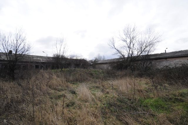 Industrial building - woodworking/carpentry shop, old cow barns - former collective farm from the socialist regime
