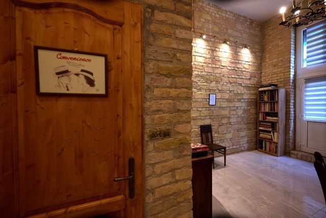 High-Ceiling Brick Gallery | Boutique Bohemian Interior