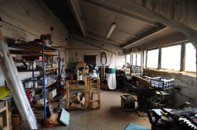 Industrial building - woodworking/carpentry shop, old cow barns - former collective farm from the socialist regime
