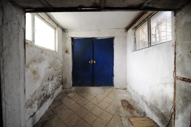 Industrial building - woodworking/carpentry shop, old cow barns - former collective farm from the socialist regime