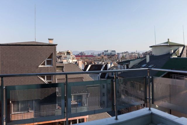 Tony's Sunny Rooftop Studio