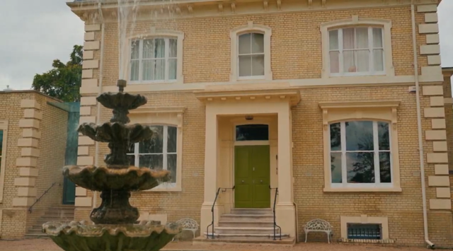 Elegant Regency estate with a private lake and indoor pool, quirky details