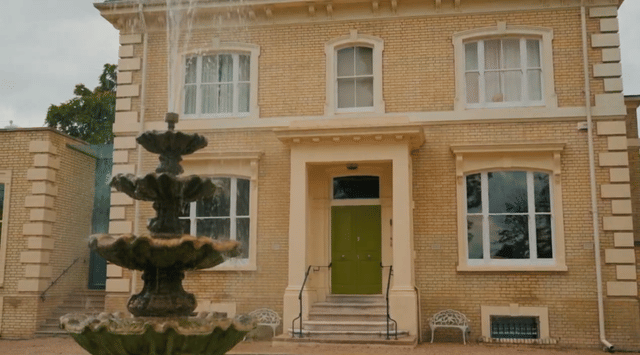 Elegant Regency estate with a private lake and indoor pool, quirky details