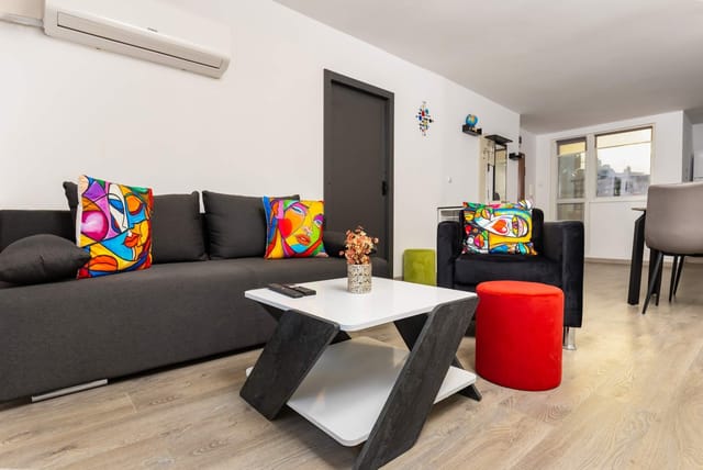 Top-Floor Flat with Balcony