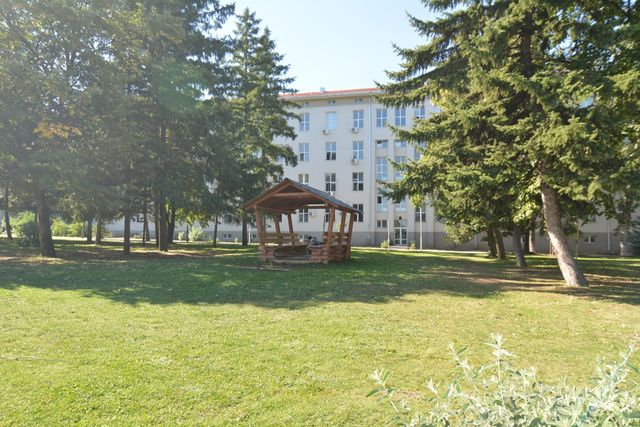 Big recognizable modern building with a bridge view of Sofia