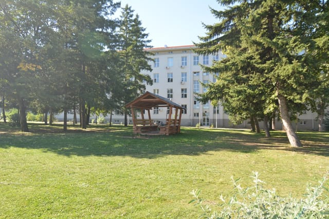 Big recognizable modern building with a bridge view of Sofia