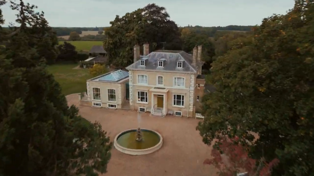 Elegant Regency estate with a private lake and indoor pool, quirky details