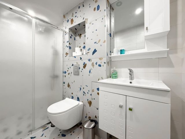 Split-Level City Stay with Balcony