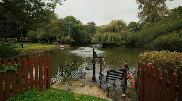 Elegant Regency estate with a private lake and indoor pool, quirky details