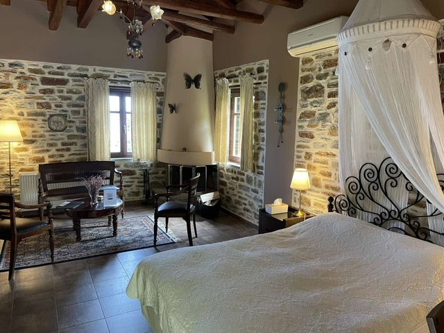 Small Luxury Hotel like an old Traditional house in Pelion with amazing garden and breathteking sea view to the agean.