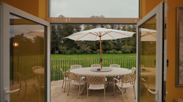 Elegant Regency estate with a private lake and indoor pool, quirky details