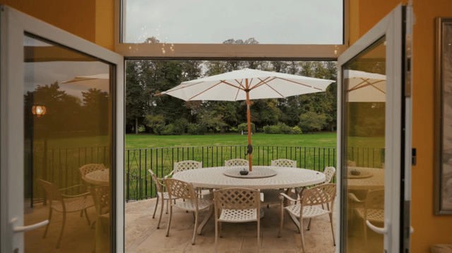 Elegant Regency estate with a private lake and indoor pool, quirky details