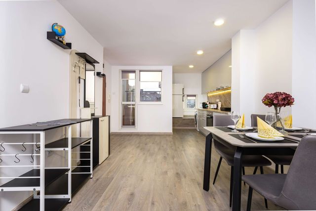 Top-Floor Flat with Balcony