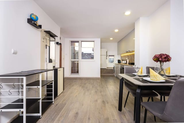 Top-Floor Flat with Balcony