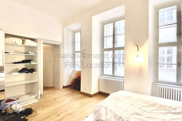 Historic Apartment with Tall Windows and High Ceilings