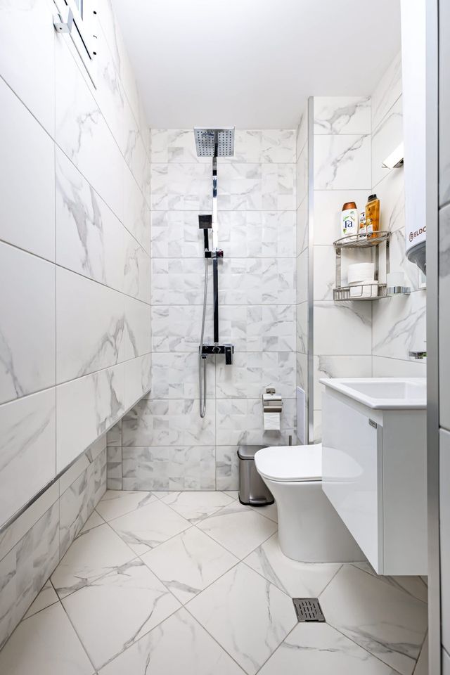 Top-Floor Flat with Balcony