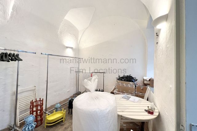 Industrial Vaulted Pottery Workshop with Brick Accent Wall