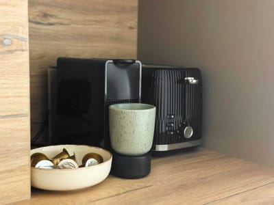 Modern & Quiet 1BR Near Center + Private Parking