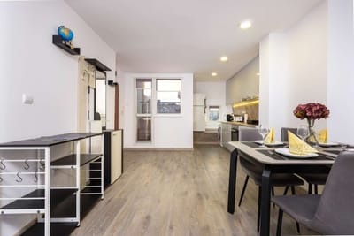 Top-Floor Flat with Balcony